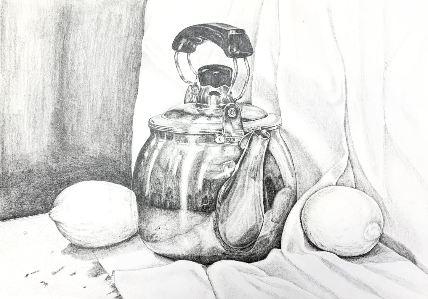 Still life of metal kettle and lemons